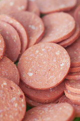 salami sausage cut into thin pieces 