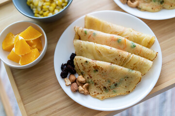 Healthy western breakfast, pancakes, nutes and fruites. Picnic breakfast