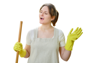 A happy woman with a mop in her hand sings while cleaning in a home kitchen, isolated on a white background