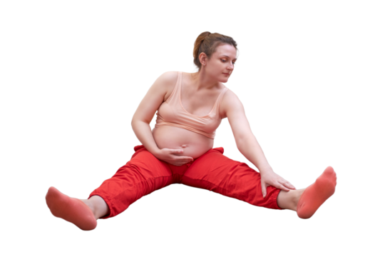 Fitness during pregnancy in the home, isolated on a white backgroundt. A pregnant woman stretches her leg and arm muscles at a sports training session at home