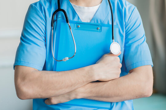 Close Up Nurse Holding Clipboard