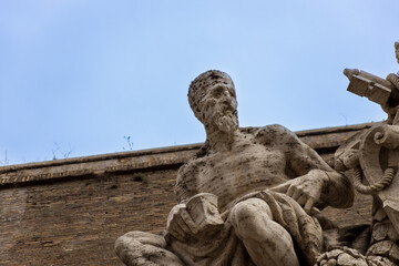 Fototapeta na wymiar Statue above Vatican Museum entrance