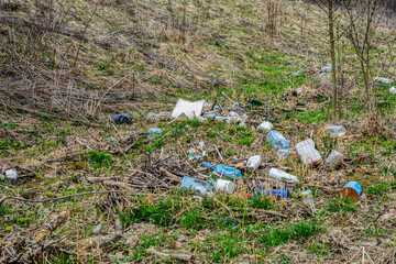 Plastic garbage in the forest.