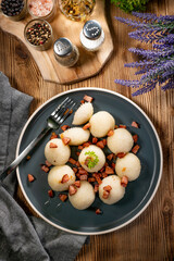 Meat stuffed potato dumplings.