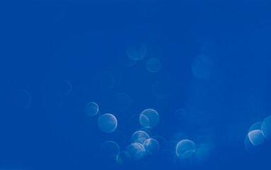 Light abstract blue bokeh christmas circle color glitter background