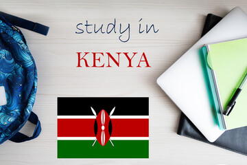 Study in Kenya. Background with notepad, laptop and backpack. Education concept.