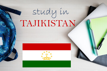 Study in Tajikistan. Background with notepad, laptop and backpack. Education concept.