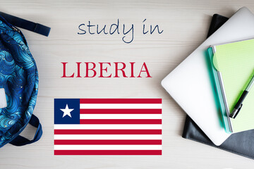 Study in Liberia. Background with notepad, laptop and backpack. Education concept.