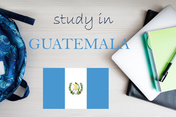 Study in Guatemala. Background with notepad, laptop and backpack. Education concept.