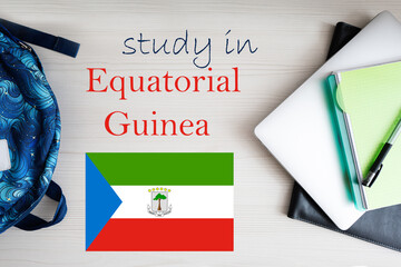 Study in Equatorial Guinea. Background with notepad, laptop and backpack. Education concept.