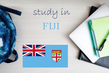 Study in Fiji. Background with notepad, laptop and backpack. Education concept.