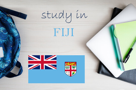 Study in Fiji. Background with notepad, laptop and backpack. Education concept. - Powered by Adobe