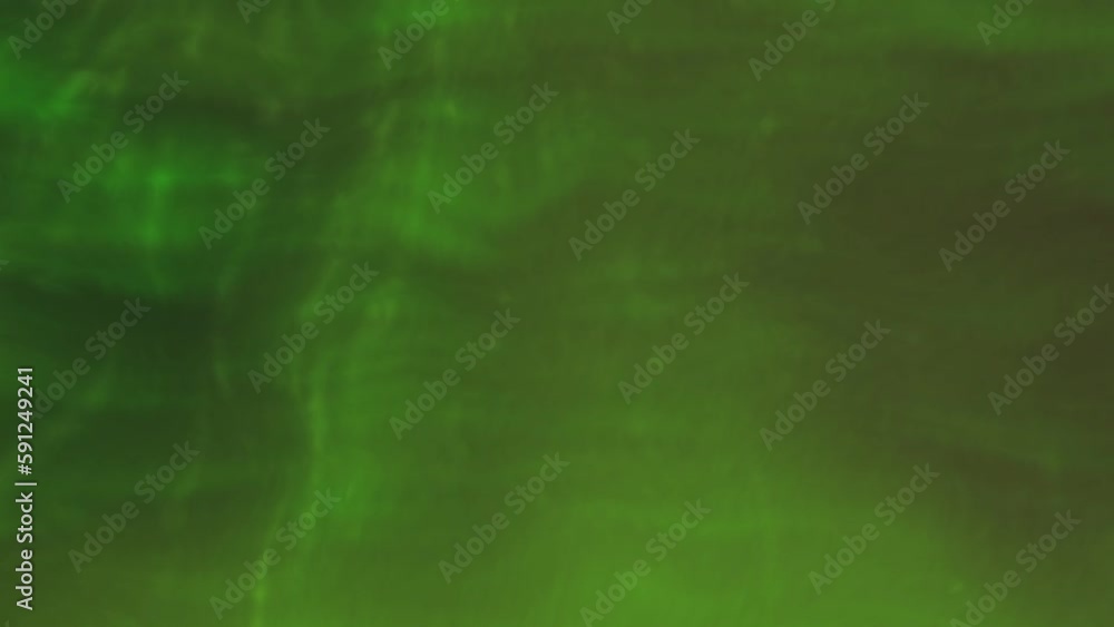 Poster green background with magic dust. motion. small illuminated particles flying in different directions
