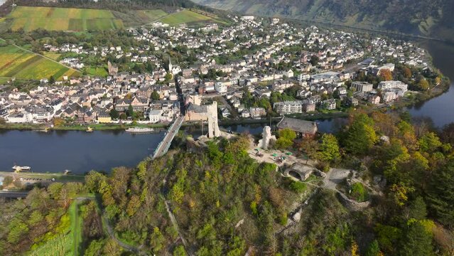 Ancient Ruins, Aerial Drone Shot in autumn of Traben-Trarbach City with Morning Fog. River Moselle, Germany. Moselland.
