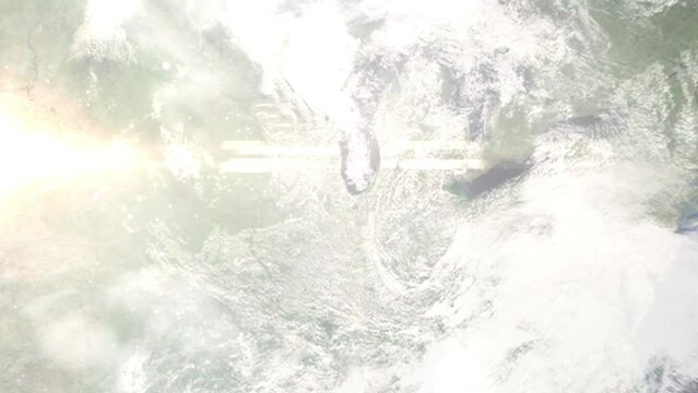 Earth zoom in from outer space to city. Zooming on Hammond, Indiana, USA. The animation continues by zoom out through clouds and atmosphere into space. Images from NASA