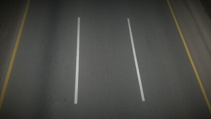 line on city asphalt road background. Asphalt road top view with  lines. lines on the road. highway textured vector background. texture of asphalt, seamless texture