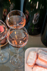 Tasting of rose brut Champagne sparkling wine in cellars of gran cru wine house in Epernay, wine tour in Champagne, France