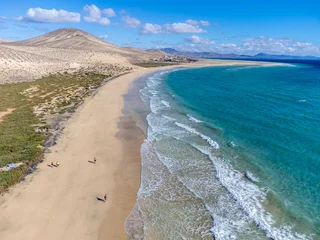 Foto auf Acrylglas Strand Sotavento, Fuerteventura, Kanarische Inseln Aerial view on sandy dunes and turquoise water of Sotavento beach, Costa Calma, Fuerteventura, Canary islands, Spain