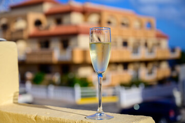 Dinner party, drinking of cava or champagne sparkling wine in vacation resort Caleta Fuste, Fuerteventura, Canary islands vacation, Spain