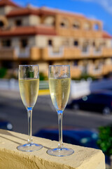 Dinner party, drinking of cava or champagne sparkling wine in vacation resort Caleta Fuste, Fuerteventura, Canary islands vacation, Spain