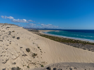 Aerial view on sandy dunes and turquoise water of Sotavento beach, Costa Calma, Fuerteventura, Canary islands, Spain