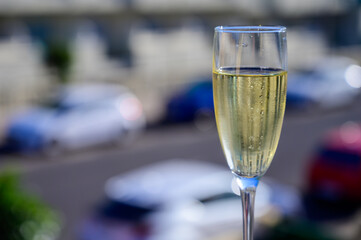 Dinner party, drinking of cava or champagne sparkling wine in vacation resort Caleta Fuste, Fuerteventura, Canary islands vacation, Spain