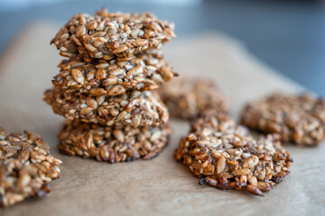 Vegan cookies made of banana and different seeds, photographed with natural light