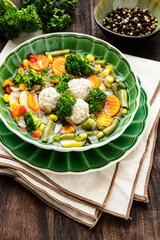 Bowl of vegetable soup with chicken meatballs