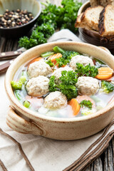 Soup with meatballs and vegetables. Concept of healthy and diet food