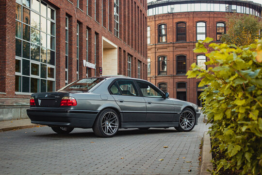 old car in the street BMW 740 e38 alpina rear