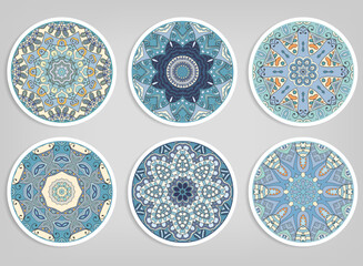Decorative round ornaments set, isolated elements. Colorful mandala, stylized flower. Abstract geometric doodle patterns for plate decoration, fabric print,  business or greeting card design