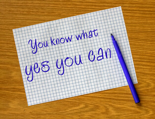 A sheet of paper in a cage and a felt-tip pen on the table