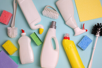 A set of different cleaning and disinfectant products on a coloured background