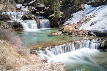 waterfall in the river in Ordesa National Park in the spanish Pyrenees (long exposure)