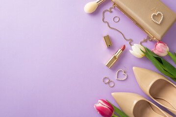 Top view flat lay of pair of high heels, a designer handbag, tulip flowers, makeup brushes, earring, lipstick and on a chic violet background with copy space