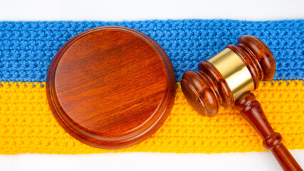gavel of justice on the background of the Ukrainian flag