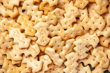 front close view little crackers on dark background crisp salt pepper color snack cips bread