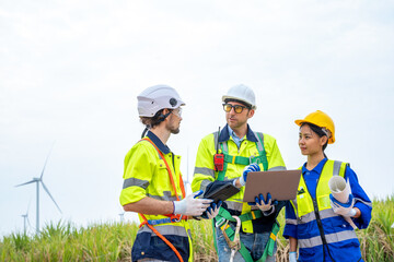 Engineer inspection wind power plants with check performance,Clean energy concept saves the world.