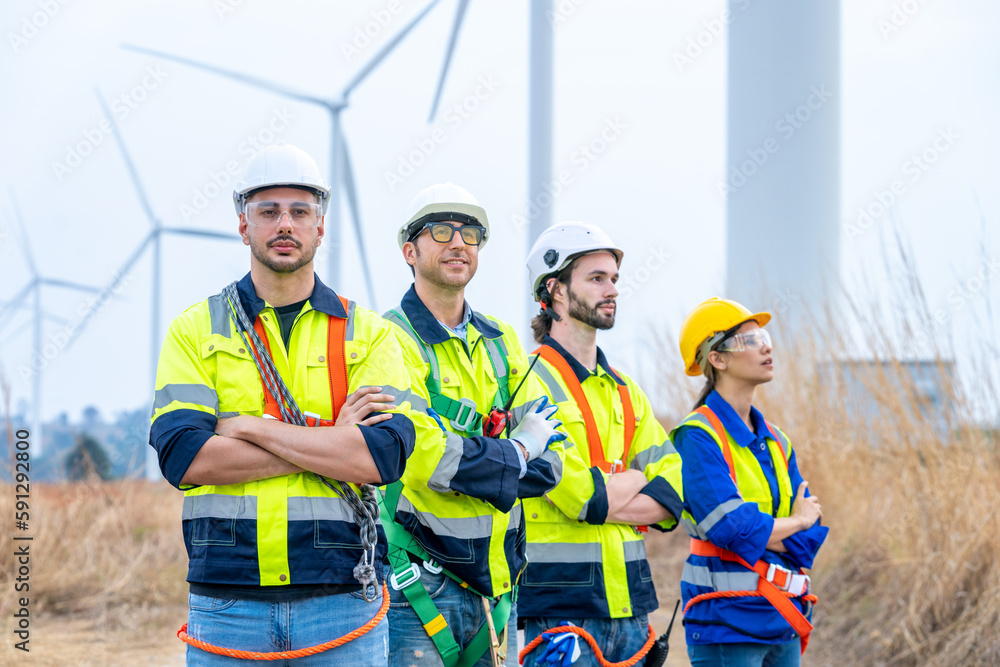 Poster group of engineers are working with a blueprint in wind turbine farm,wind power station,renewable an