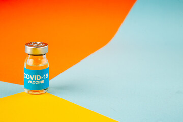 front view antivirus vaccine in little can on the colorful background lab drug covid- health science virus cure pandemic
