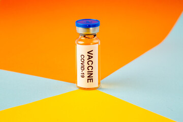 front view antivirus vaccine on orange-blue background lab disease drug covid- health science virus vaccine cure