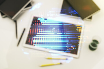 Multi exposure of abstract graphic coding sketch with world map and modern digital tablet on desktop on background, top view, big data and networking concept