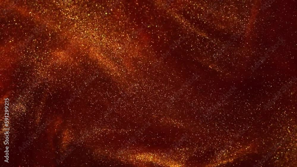 Wall mural golden particles floating in red liquid. vortex of gold dust particles swirl and abstract float in r