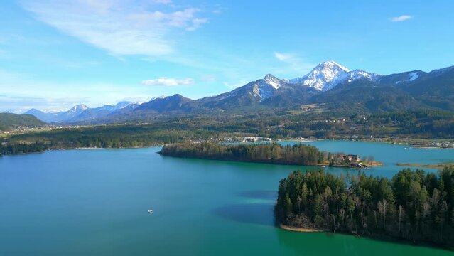 Flight over a fairytale lake with turquoise-blue water - travel photography