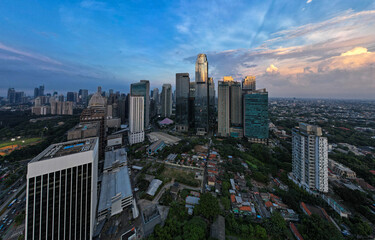 Fototapeta na wymiar aerial photos of Sudirman street and Jakarta Skyline in the golden hour. 