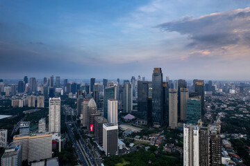Fototapeta na wymiar aerial photos of Sudirman street and Jakarta Skyline in the golden hour. 