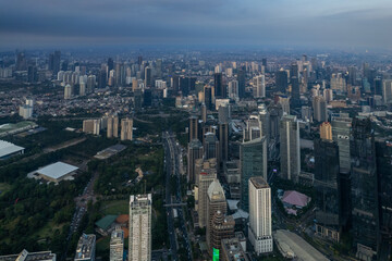 Fototapeta premium aerial photos of Sudirman street and Jakarta Skyline in the golden hour. 