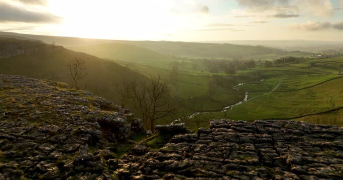 Aerial shot of Malham Cove at sunrise