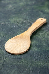 front view wooden spoon on dark background knife kitchen dinner wood color food table meal
