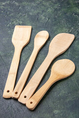 front view wooden utencils on gray background knife kitchen cutlery dinner wood color food